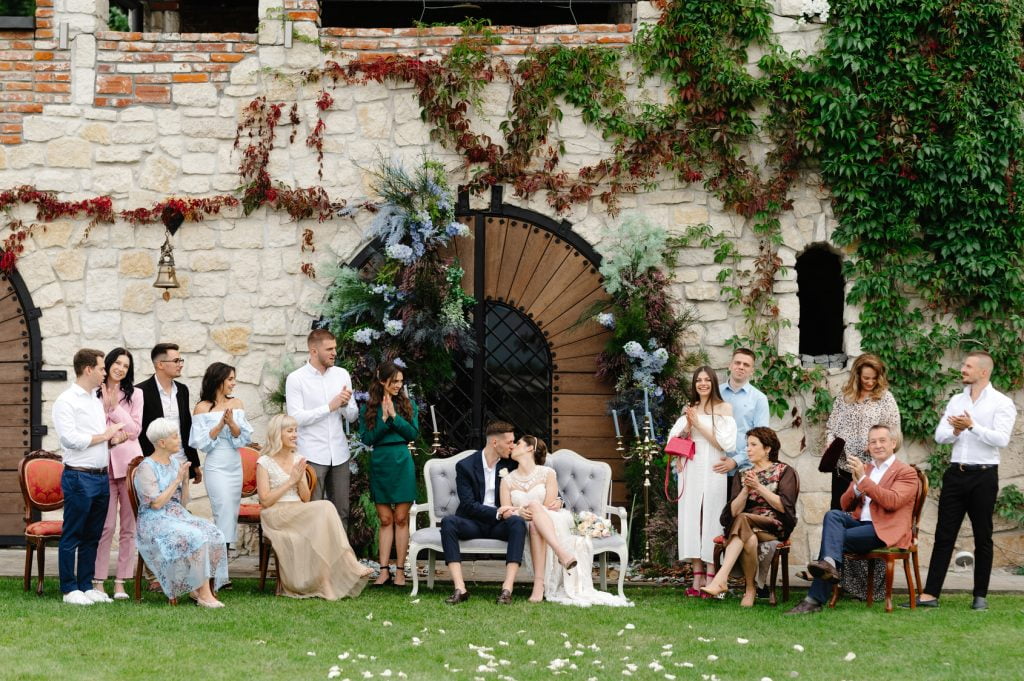 wedding guests newlyweds backyard